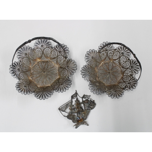 34 - A pair of white metal filigree baskets and a small filigree galleon, 5cm (3)