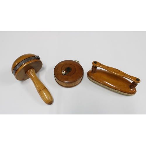 368 - A collection of fruitwood and boxwood items to include a tape measure, nail buffer and darning mushr... 