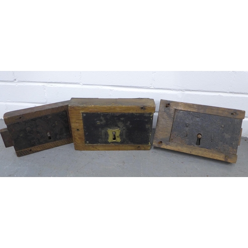 370 - Three antique lock plates and keys, a pair fo iron horse stirrups and a brass sundial (5)