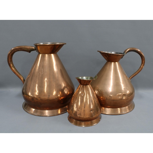 407 - A Dring & Fage three Gallon copper jug, a Victorian 2 Gallon copper jug and a half gallon copper jug... 