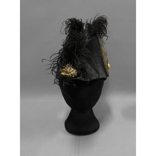 413 - French hats to include three felt Kepi hats and a court dress bicorn hat with braid and black feathe... 