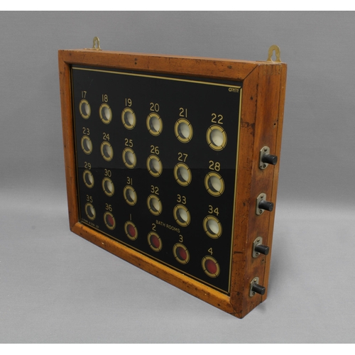 415 - Edwardian electric servants bell board by Gents of Leicester, for A. Pank & Sons, with four side noz... 