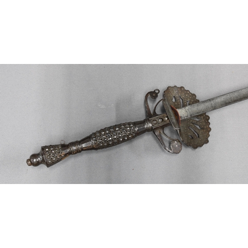 443 - Cut steel court sword, the grip and guard with raised cut diamond shaped facets, rapier blade, inscr... 