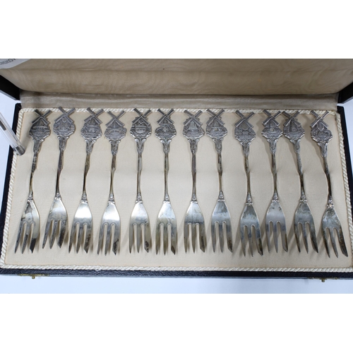 54 - Cased set of twelve Dutch silver pastry forks, stamped 835, cased set of six Birmingham silver coffe... 