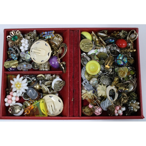 64 - Two leather  jewellery boxes containing a selection of vintage and later costume jewellery (a lot)