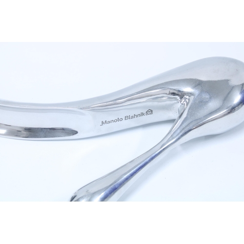 68 - Manola Blahnik polished aluminium shoe horn, 27cm long