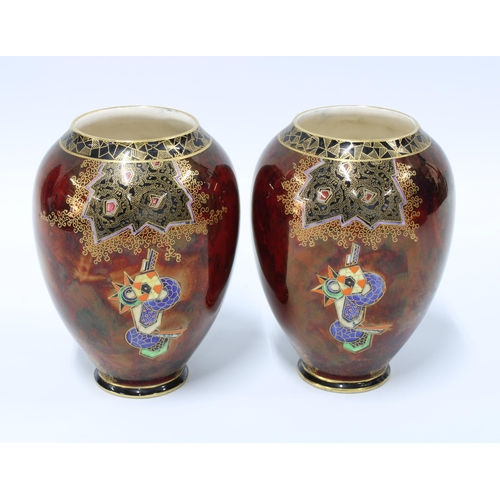 79 - A pair of Crown Devon red lustre vases, painted with parrots in pattern 2114, 13cm  (2)