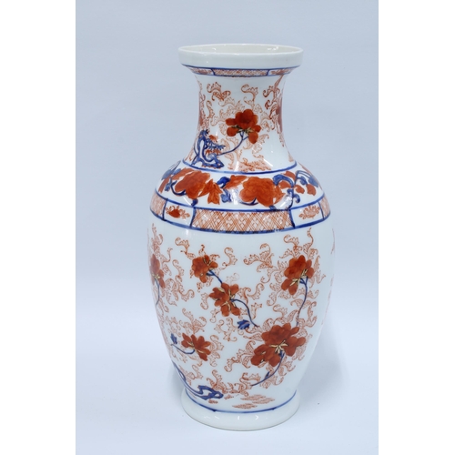 84 - Imari baluster vase typically decorated with flowers and foliage, 31cm