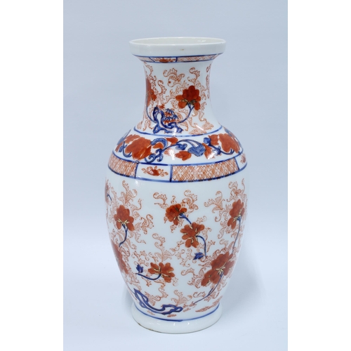 84 - Imari baluster vase typically decorated with flowers and foliage, 31cm