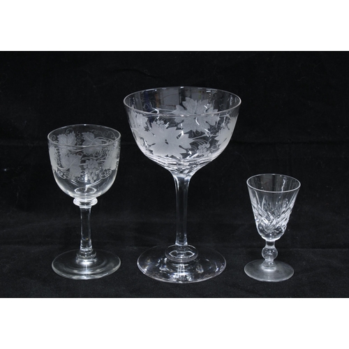 99 - Group of fruit and vine etched glass wine glasses and a set of eight crystal sherry glasses (14)