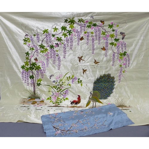 300 - An embroidered silk panel with peacocks and foliage, 150 x 140cm  together with a blue embroidered p... 