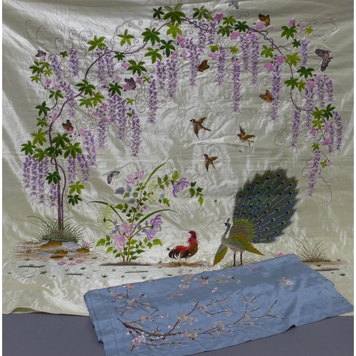 300 - An embroidered silk panel with peacocks and foliage, 150 x 140cm  together with a blue embroidered p... 