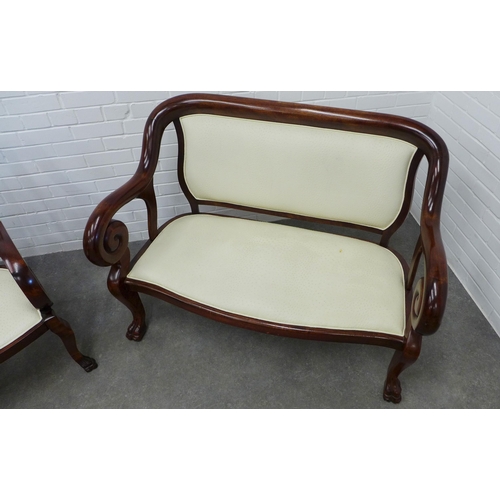 260 - Modern mahogany framed two seater settee and matching armchair, upholstered in cream faux leather, (... 