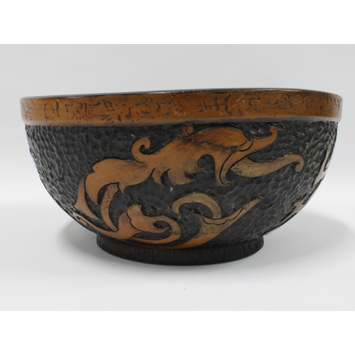 111 - Early 20th century Dragon pokerwork fruit bowl, 30cm diameter