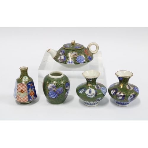 115 - A collection of five miniature Japanese porcelains to include vases and a teapot, 6cm  (5)