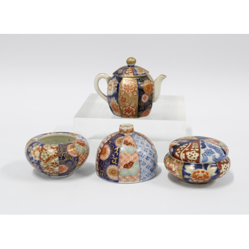 119 - A collection of four miniature Japanese porcelains to include Fukagawa vases and a teapot, etc, 5cm ... 