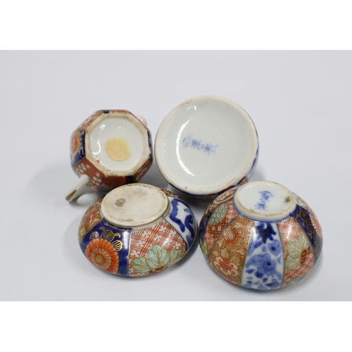 119 - A collection of four miniature Japanese porcelains to include Fukagawa vases and a teapot, etc, 5cm ... 