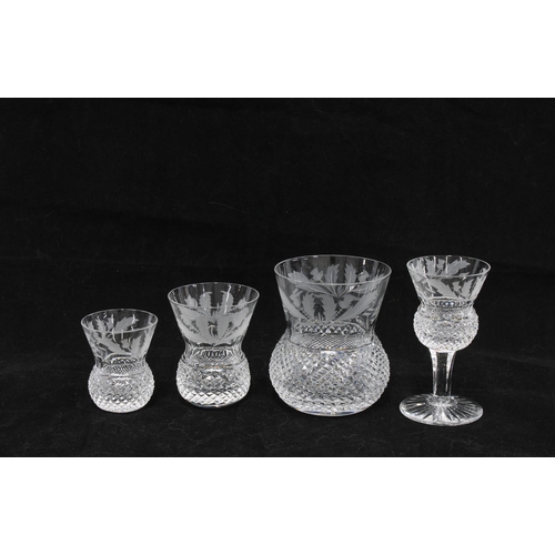 124 - A part suite of Edinburgh Crystal thistle patterned glass to include a small decanter and stopper, 2... 