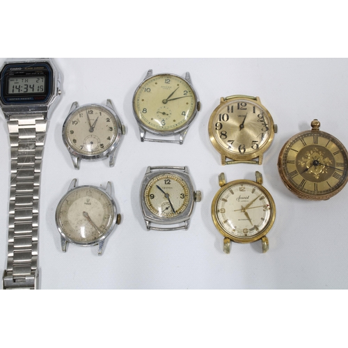 15 - Collection of vintage wrist watches and watch faces and a lady's foliate engraved fob watch stamped ... 