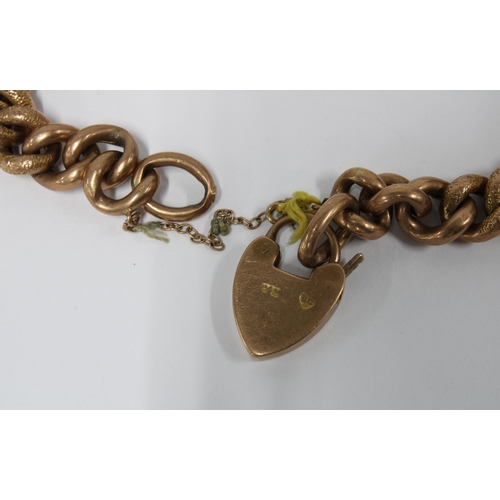 19 - 9ct rose gold curb link bracelet with heart shaped padlock, approx 18.5g