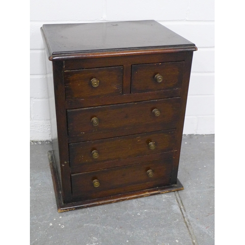 294 - Miniature chest with rectangular top and moulded edge over two short and three long drawers, 39 x 31... 