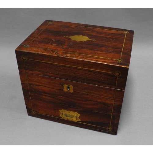 307 - 19th century rosewood and brass inlaid decanter box, the hinged lid opening to reveal a set of three... 