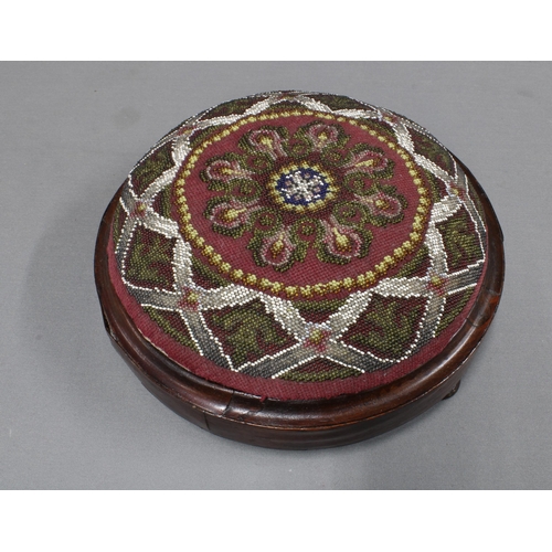 312 - Victorian mahogany footstool with circular beadwork top. 28cm.