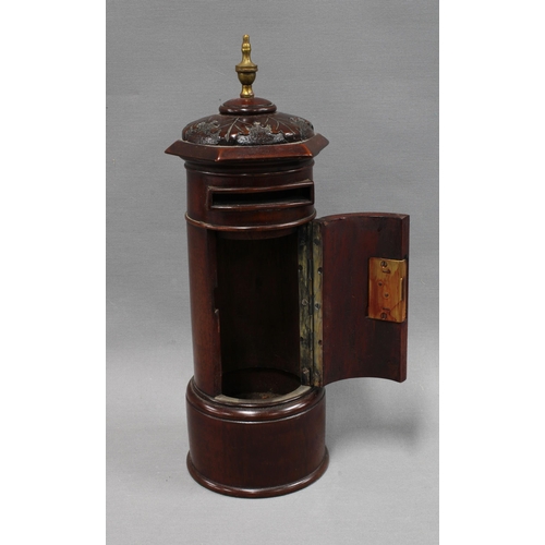 340 - 20th century stained mahogany table top post box, cylindrical form with domed top having acorn patte... 