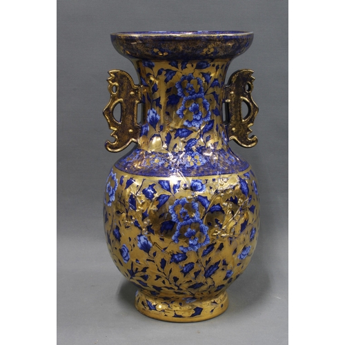 355 - Large chinoiserie baluster vase with underglaze blue and white floral pattern and overlaid gilding, ... 