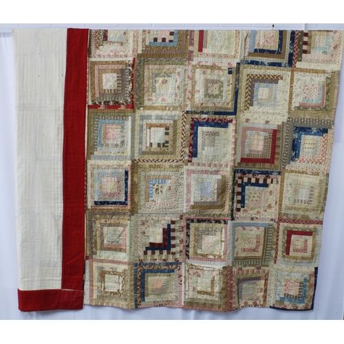 372 - 19th century American Log Cabin Patchwork Quilt, incorporating beige, blue and red panels, the under... 