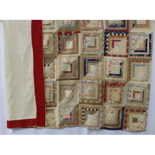 372 - 19th century American Log Cabin Patchwork Quilt, incorporating beige, blue and red panels, the under... 