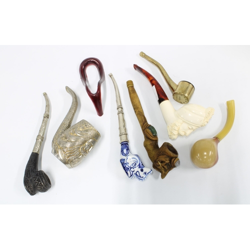 402 - A collection of pipes to include a modern Meerschaum pipe, (7)