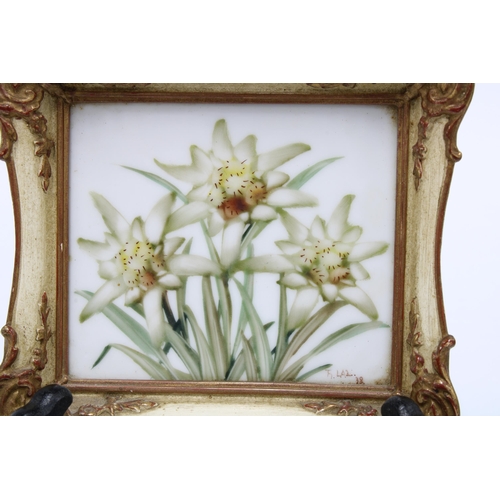 419 - Two floral painted plaques, signed with initials and dated '38, in moulted gilt frames, size overall... 