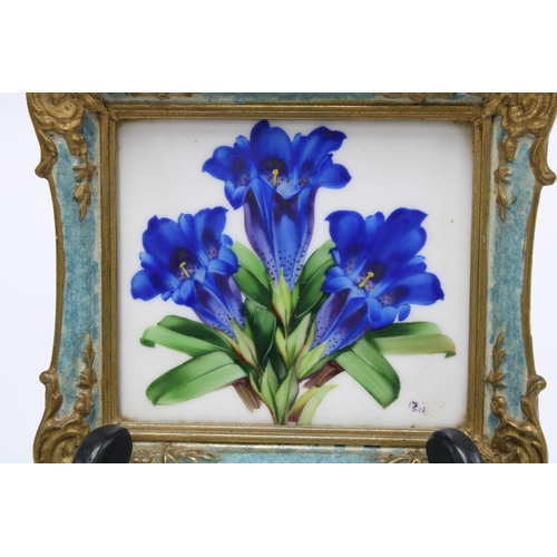 419 - Two floral painted plaques, signed with initials and dated '38, in moulted gilt frames, size overall... 