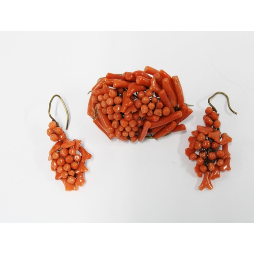 42 - Late 19th / early 20th century coral brooch and earrings set, in the form of grapes, (3)