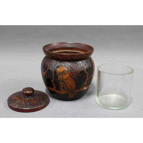 445 - Pokerwork tobacco jar together with two match box holders, one inthe form of an owl. 12cm. (3)