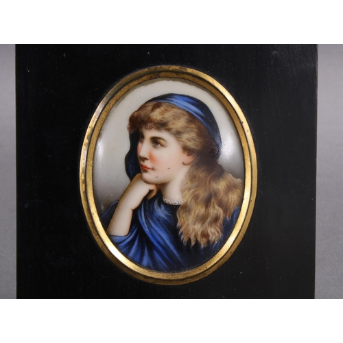 447 - Painted porcelain portrait  miniature. 9 x 7cm.