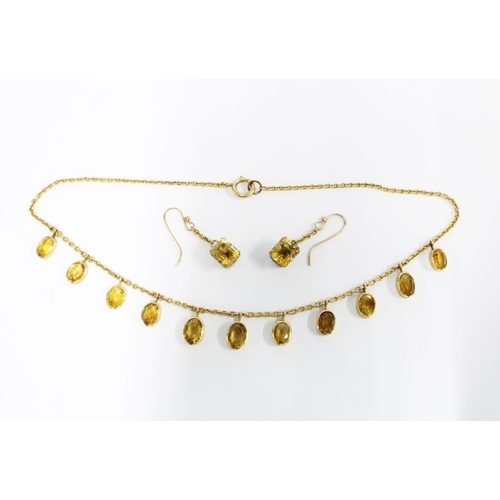 46 - 15ct gold necklace suspended with eleven oval citrines, stamped 15ct, together with a pair of drop e... 