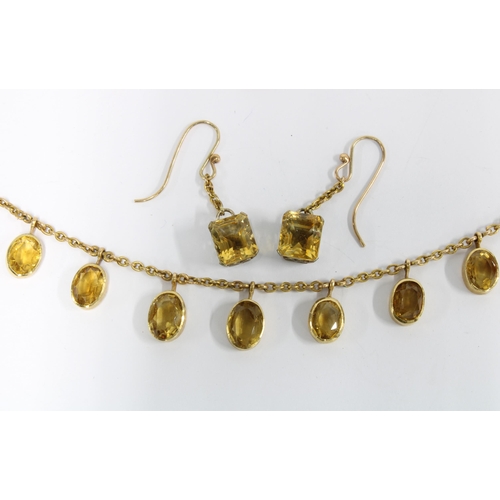 46 - 15ct gold necklace suspended with eleven oval citrines, stamped 15ct, together with a pair of drop e... 