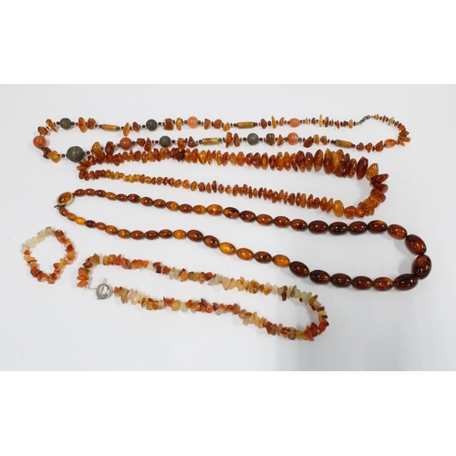 61 - Four strands of amber beads and a bracelet (5)