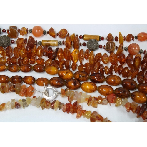 61 - Four strands of amber beads and a bracelet (5)