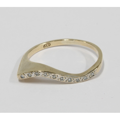 62 - 9ct gold wishbone ring set with diamonds, size M