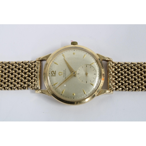 73 - Gents vintage 9ct gold Omega Automatic wristwatch, champagne dial with Arabic numeral at 12 and bato... 