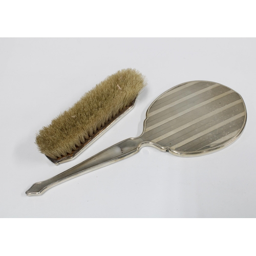 8 - George VI silver backed hand mirror, Birmingham 1938 and a silver backed clothes brush, Birmingham 1... 