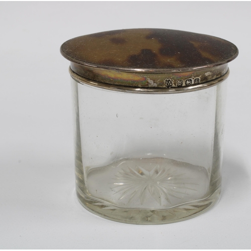 9 - Early 20th century glass jar with silver and tortoiseshell lid, Birmingham 1930, 7 cm high and a tor... 