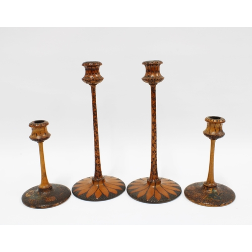 95 - Two pairs of /art Nouveau pokerwork candlesticks, tallest 25cm  (4)