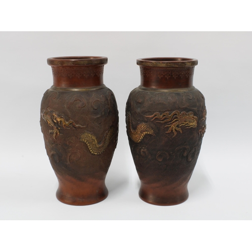 116 - A pair of Chinese terracotta dragon vases, impressed seal mark, 24cm  (2)