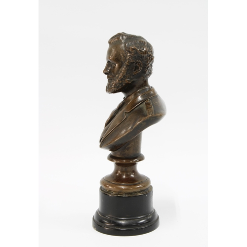 121 - Bronze head and shoulders bust on a socle base, impressed JOHN BROWN 1869 JB 19cm