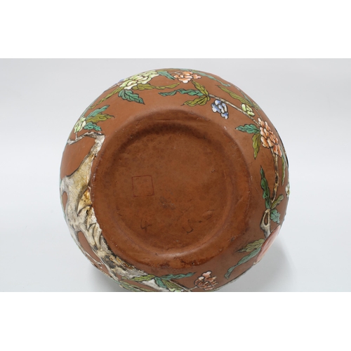 140 - Terracotta vase with enamelled floral decoration, 34cm