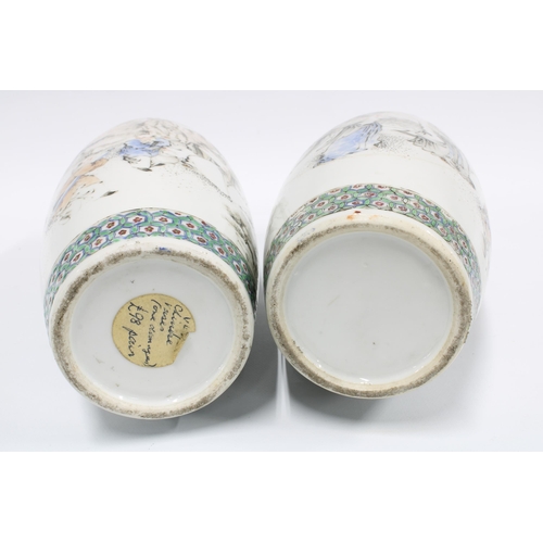 146 - A pair of Chinese vases painted with figures and calligraphy, one a/f, 30cm  (2)